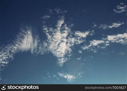 Clouds with beautiful of shapes at the blue sky.