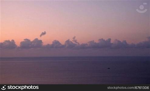 Cloudscape above the sea at sunrise