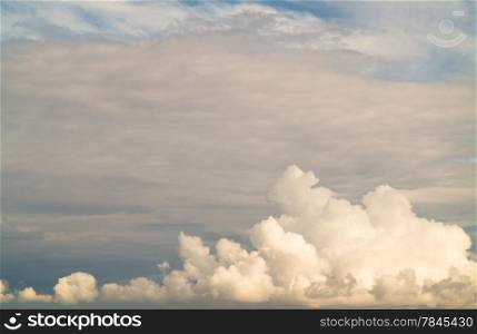 Cloudscape. Blue sky background and fluffy white cloud. Sunny day. Cumulus cloud