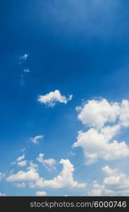 Cloudscape of bright blue sky