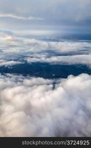 Cloudscape vertical background with heapy clouds.