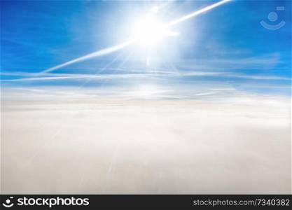 Cloudscape view with blue sky, clouds and sunset sun light