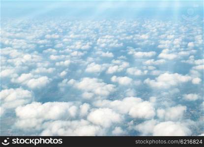 Cloudscape with blue sky, clouds and sun rays