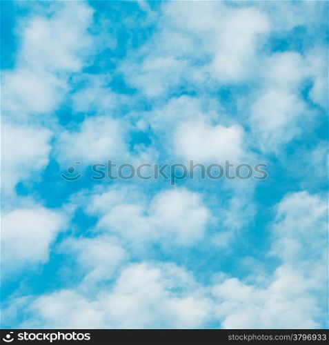 cloudscape with stratocumulus clouds at sunny day