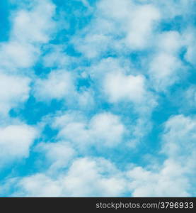 cloudscape with stratocumulus clouds at sunny day