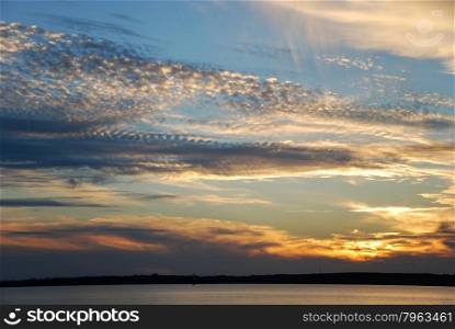 Cloudscape with unusual formations at sunset at the Baltic Sea in Sweden