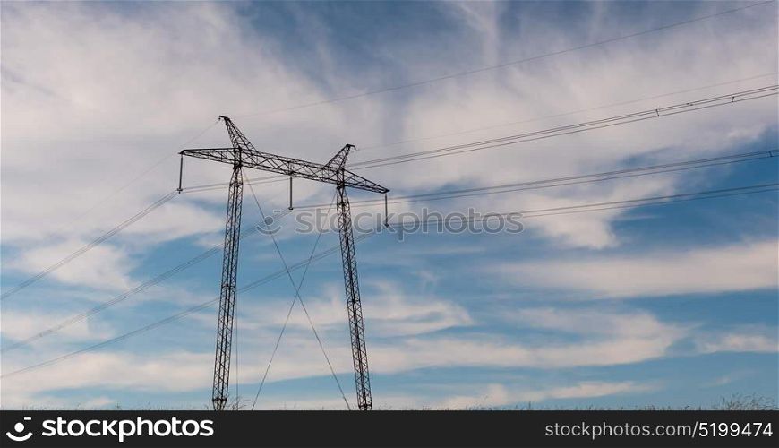 cloudy morning sky and a high-voltage line. cloudy morning sky and a high-voltage line.
