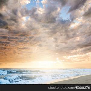 Cloudy sea sunset. Dramatic cloudy sunset at seaside