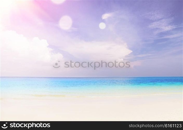 cloudy seascape at sunny day with slight lens flare. cloudy seascape background