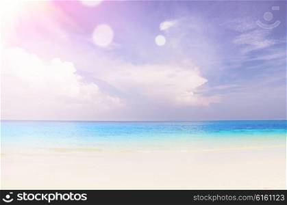 cloudy seascape at sunny day with slight lens flare. cloudy seascape background