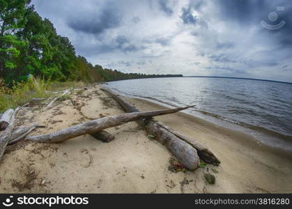 cloudy skies over body of water