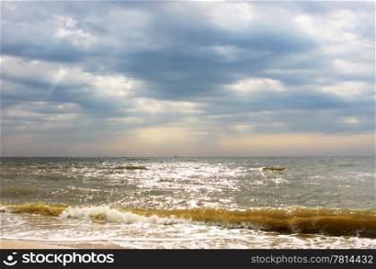 Cloudy sky above a sea, background