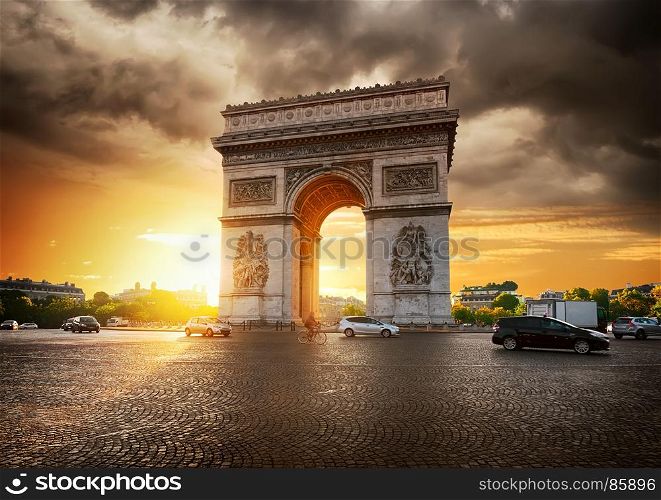 Cloudy sky and Arc de Triomphe in Paris, France