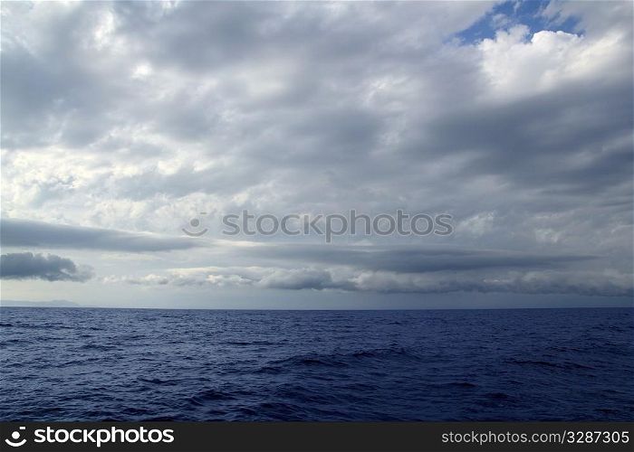 cloudy stormy day in the blue ocean sea seascape
