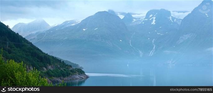 Cloudy summer view over Glomfjorden, Nordland, Norway. Panorama.