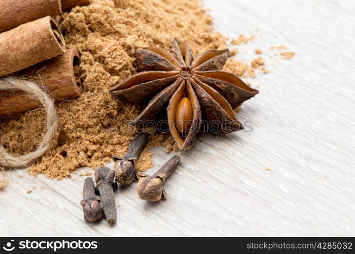 Cloves, anise and cinnamon isolated on white background