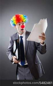 Clown businessman in funny business concept