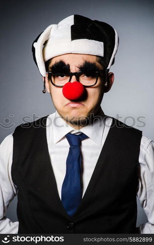 Clown businessman in funny concept