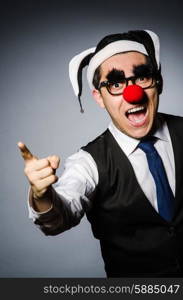 Clown businessman in funny concept