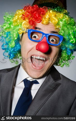 Clown businessman in funny concept