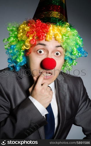 Clown businessman in funny concept