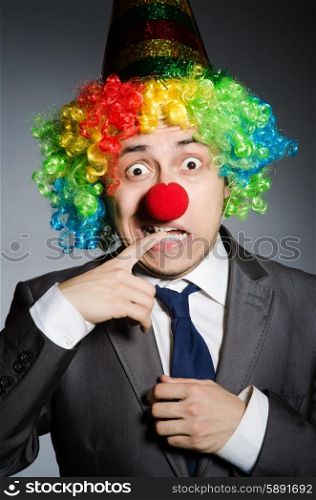 Clown businessman in funny concept