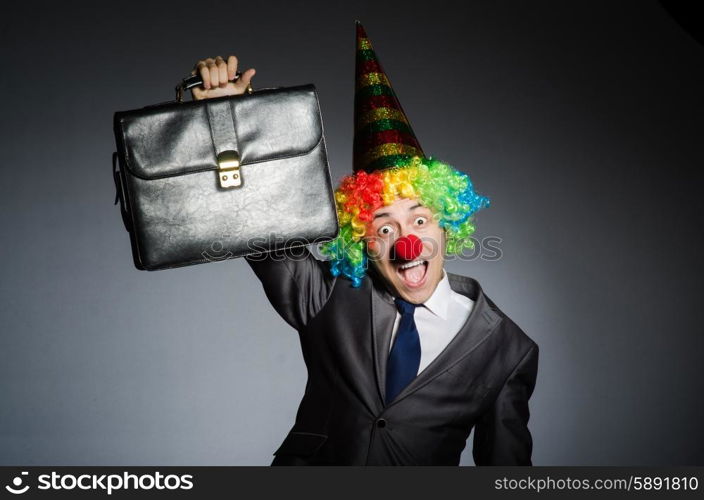 Clown businessman in funny concept