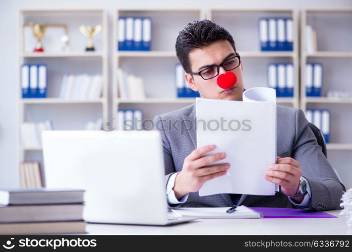 Clown businessman in the office