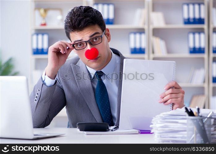 Clown businessman in the office