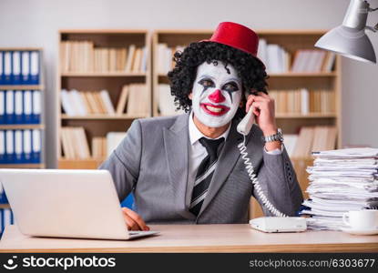 Clown businessman working in the office