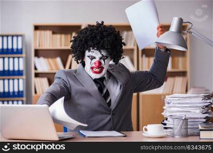 Clown businessman working in the office