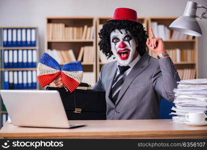 Clown businessman working in the office