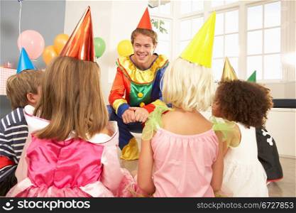 Clown entertaining children at party