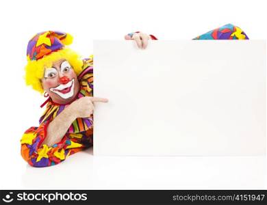 Clown reclines while pointing to a blank sign. Design element on white background.