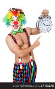 Clown with alarm clock on white