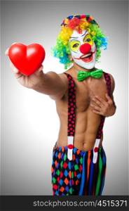 Clown with heart isolated on white