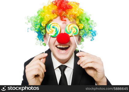 Clown with lollipop isolated on white