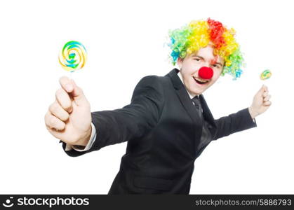 Clown with lollipop isolated on white