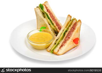 Club sandwiches with dip sauce on the plate. Club sandwiches