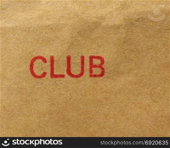 Club stamp over paper. red club stamp over brown paper envelopment
