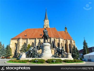 Cluj Napoca city Romania Statue of Matei Corvin and Saint Michael Church