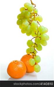 Cluster of grapes and tangerine