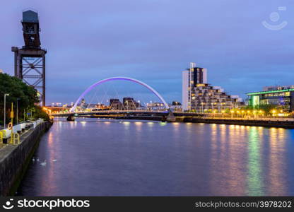 Clyde Arc Bridge along River Clyde Sunset twilight at Glasgow city Scotland UK.