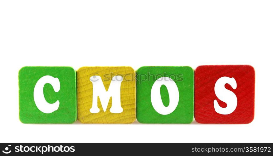 cmos - isolated text in wooden building blocks