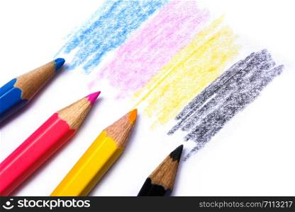 cmyk concept / wooden crayon texture with cyan blue red magenta yellow and black drawings on white paper background