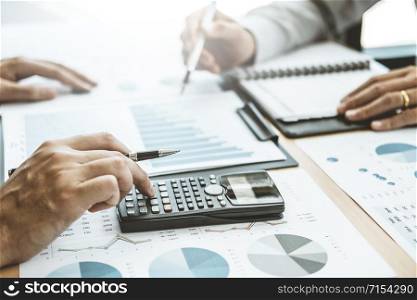 Co-working Business Team Consulting meeting Planning Strategy Analysis investment and saving concept. meeting discussing new plan financial graph data.