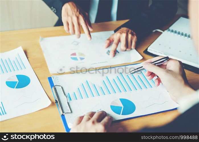 Co-working Business Team meeting Planning Strategy Analysis investment and saving concept. meeting discussing new plan financial graph data