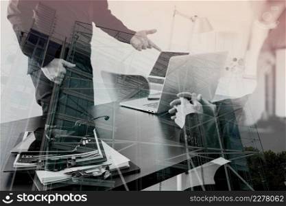 co working meeting,two businessman using VOIP headset with latop computer on desk in modern office as call center and customer service help desk concept with London city background,double exposure