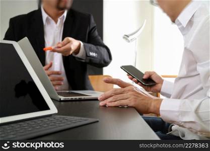 co working team meeting concept,businessman using smart phone and digital tablet and laptop computer in modern office