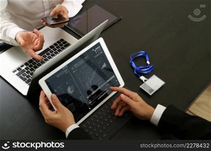 co working team meeting concept,businessman using smart phone and digital tablet and laptop computer and name tag in modern office